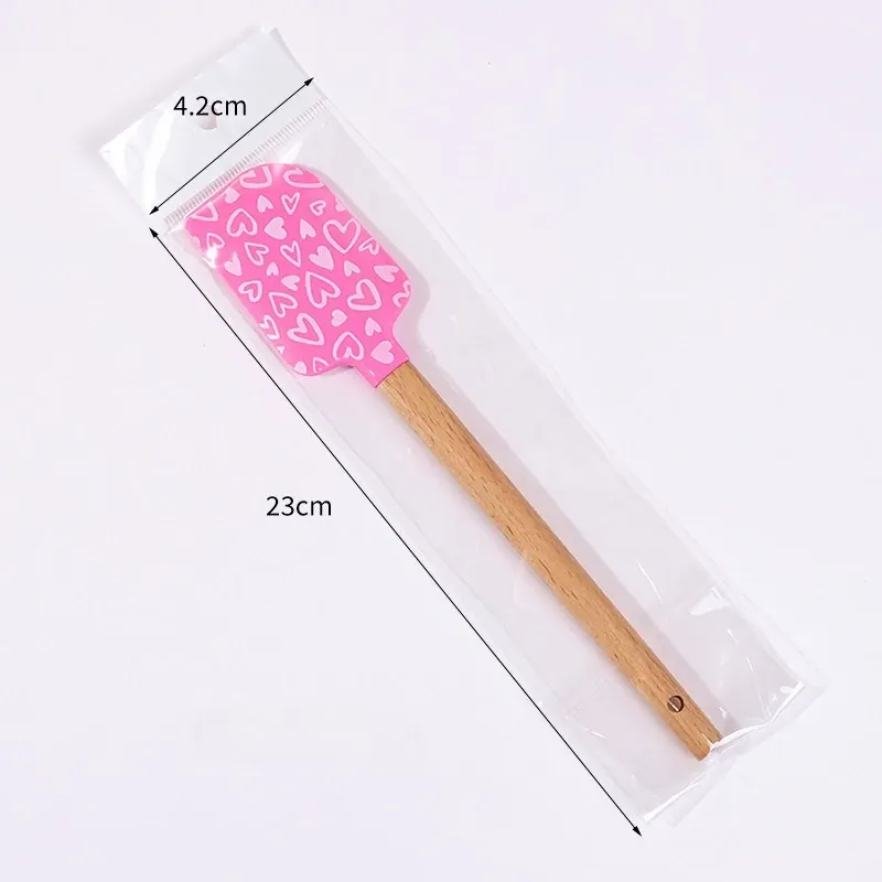 Spatule en Silicone Motifs Cœurs avec Manche en Bois
